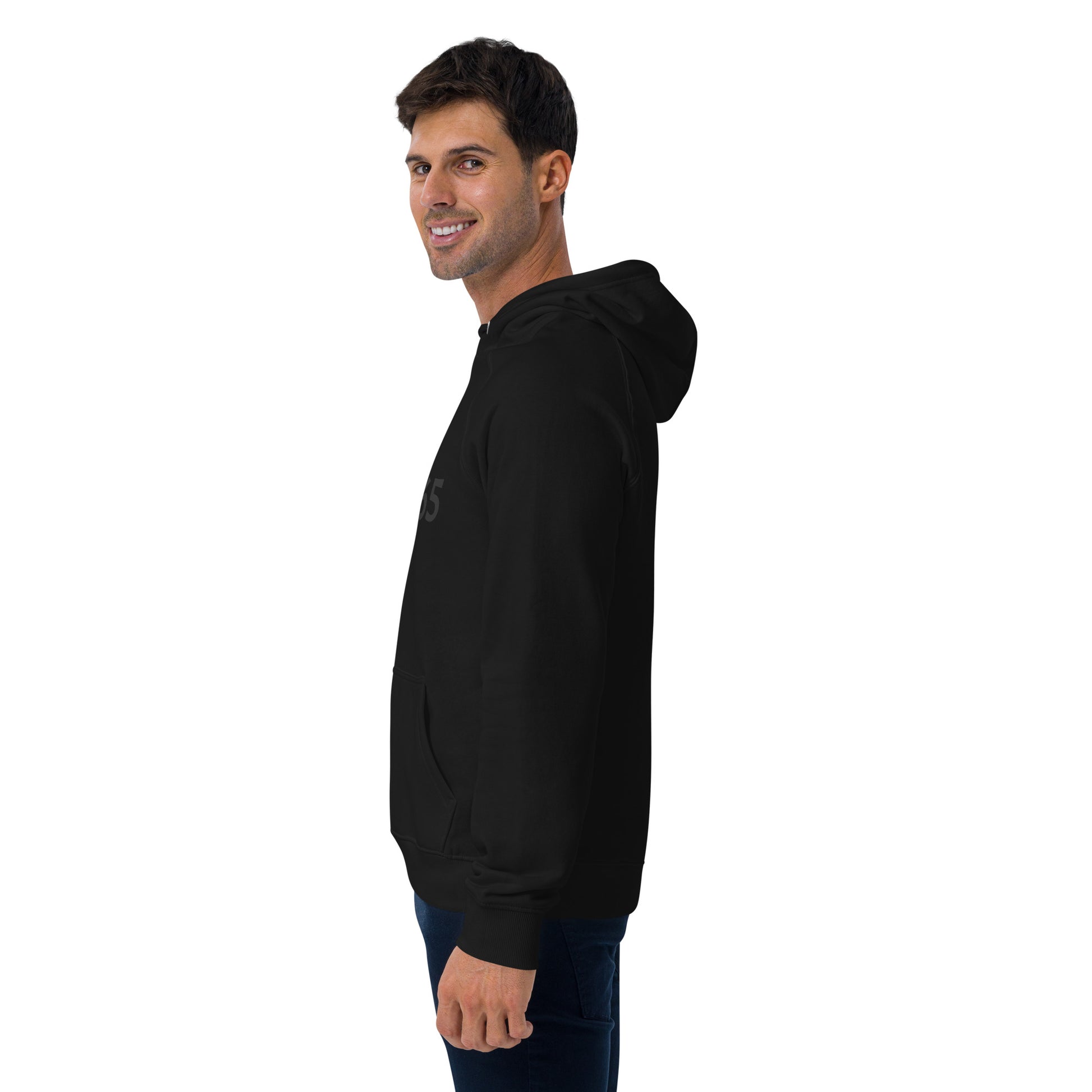 Stylish man wearing the CSM365 Blackout Clutch Hoodie, perfect for comfort and versatility in any outfit.